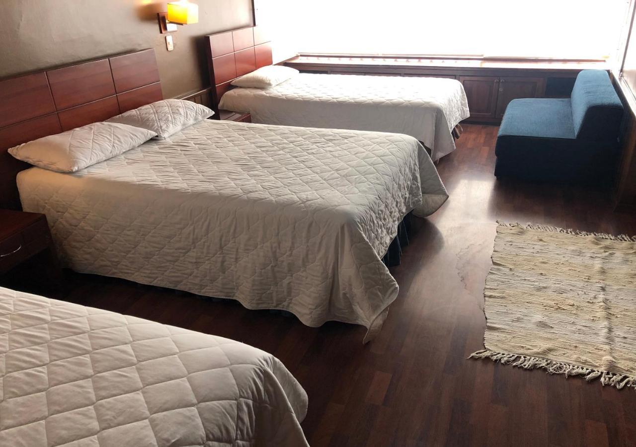 Filatelia Suites & Travel Quito Ruang foto